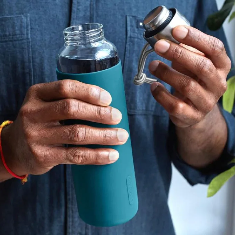 Deepen Your Practice With Budget-Friendly Accessories Black + Blum Glass Water Bottle 600ml with Silicone Sleeve Deepen Your Practice With Budget-Friendly Accessories Black + Blum Glass Water Bottle 600ml with Silicone Sleeve